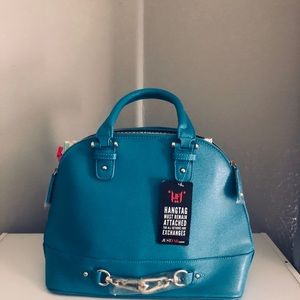 I’m selling a Just Fab bag brand new with tags
